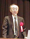 講師の総務省情報局通信政策局・吉崎正弘情報通信政策課長
