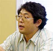 事業を説明する小松正明TMO・三条情報発信事業部会長