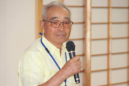あいさつする榎内さん