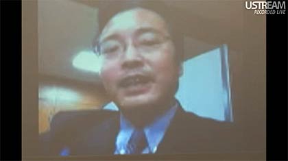 佐賀県武雄市の「F＆B良品ホールディングス」設立に伴う記者会見にSkypeで出席、発言する国定三条市長（写真はUSTREAMから）