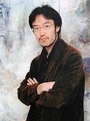  会場に展示している鶴巻謙郎さんの写真