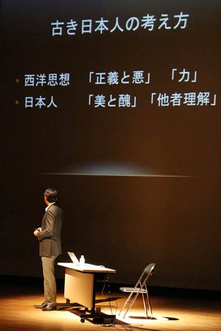 燕市で講演する高野進さん