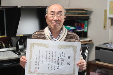 信濃川・大河津写真コンテストで最高賞のグランプリに輝いた三井田可人さん、自宅のパソコン部屋で