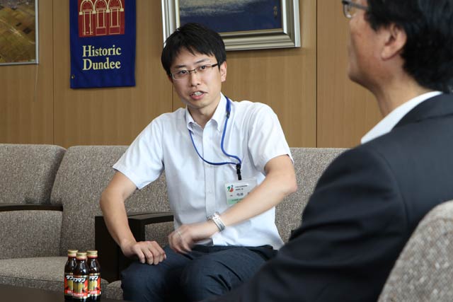 村上市へ被害状況調査業務の支援に派遣される今井主事