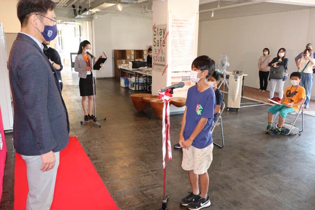 三条ものづくり学校での開会式で栄北小6年酒井さんがあいさつ
