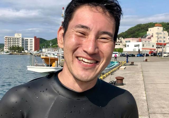 準備を進めた第1泳者の中野さん