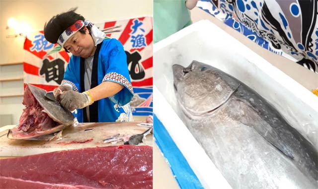 佐渡産マグロと解体ショーを行うジョニー江口さん