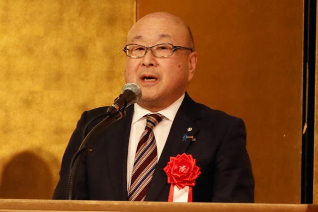 本間弥彦村長