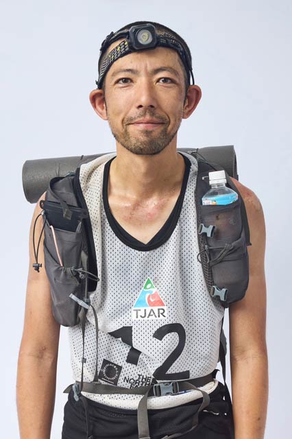 レースの装備の中村さん