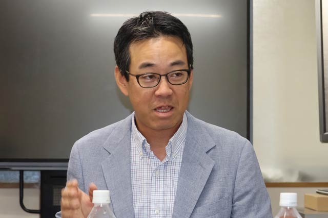 実行委員長の松橋教授